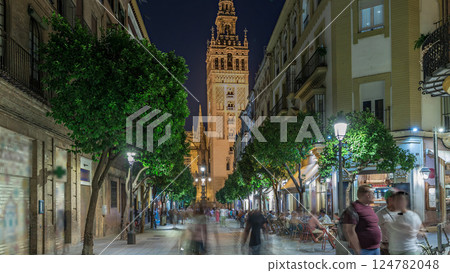 Barrio Santa Cruz Seville timelapse street at night with Giralda tower 124782048