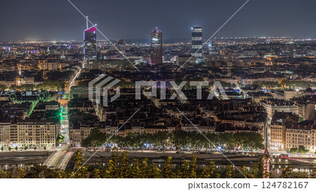 Panoramic aerial view of Lyon with skyscrapers from Fourviere Hill at night. France Panoramic aerial view of Lyon with skyscrapers from Fourviere Hill at night. France 124782167