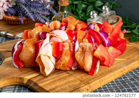 Raw chicken shashlik. 124782177