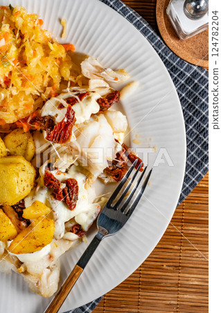 Baked pieces of cod. Baked pieces of cod. 124782204