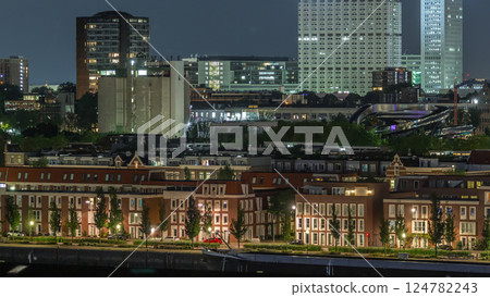 Panoramic aerial timelapse of Katendrecht peninsula at night and Maashaven harbour in Rotterdam, The Netherlands. 124782243