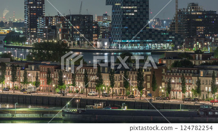 Panoramic aerial timelapse of Katendrecht peninsula at night and Maashaven harbour in Rotterdam, The Netherlands. 124782254
