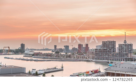 Panoramic aerial day to night timelapse of Katendrecht peninsula and Maashaven harbour in Rotterdam, The Netherlands. Panoramic aerial day to night timelapse of Katendrecht peninsula and Maashaven harbour in Rotterdam, The Netherlands. 124782265
