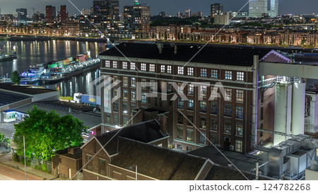Aerial panoramic view over Maashaven night timelapse in Rotterdam. Netherlands Aerial panoramic view over Maashaven night timelapse in Rotterdam. Netherlands 124782268