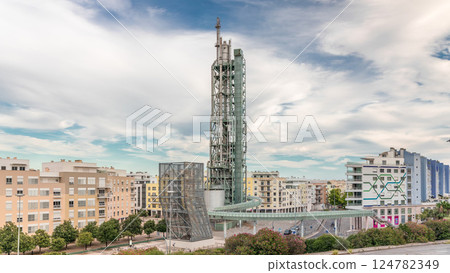 Timelapse hyperlapse of old steel refinery tower with spiral ramp in Lisbon's Park of Nations modern district. Portugal 124782349