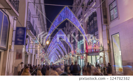 Night timelapse hyperlapse of Christmas lights and decorations in downtown Lisbon at Chiado 124782382