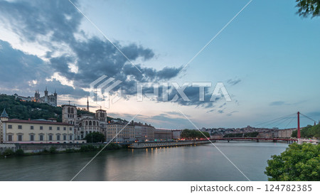 Timelapse of Saint John the Baptist Cathedral and Basilica of Notre-Dame de Fourviere in Lyon, from day to night. France Timelapse of Saint John the Baptist Cathedral and Basilica of Notre-Dame de Fourviere in Lyon, from day to night. France 124782385