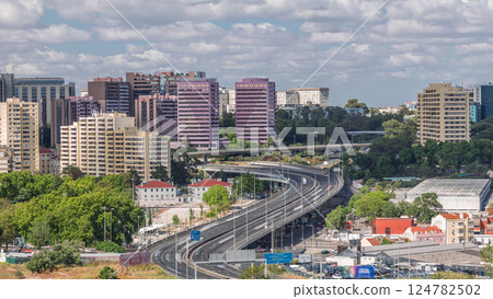 High perspective view of IP7 highway elevated road with curve turn near zoo aerial timelapse. Lisbon, Portugal High perspective view of IP7 highway elevated road with curve turn near zoo aerial timelapse. Lisbon, Portugal 124782502