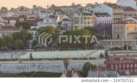 Aerial view over the center of Lisbon to the viewpoint called Miradouro de Sao Pedro de Alcantara timelapse. Portugal 124782512