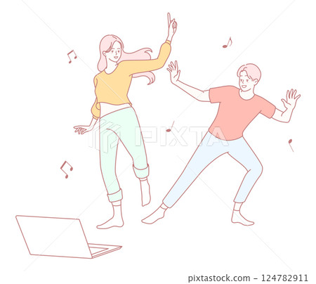 Young people dancing joyfully at home while using their laptops and enjoying music and fun 124782911