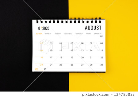August 2026 desk calendar on black and yellow background, Flat lay. 124783852