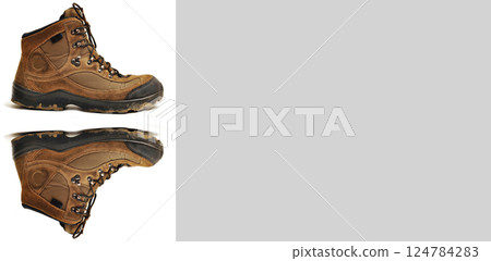 Hiking shoes and a white background, sturdy hiking boots, strong hiking beige and brown boots Hiking shoes and a white background, sturdy hiking boots, strong hiking beige and brown boots 124784283