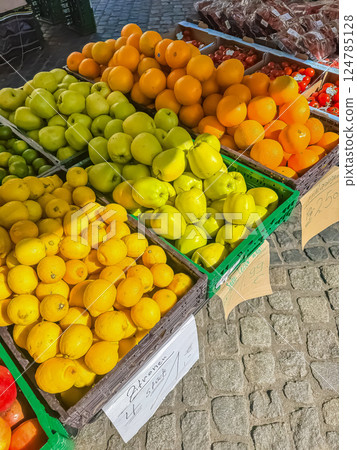Citrus Fruits and Apples at Outdoor Market, Colorful Produce, Healthy Food. High quality photo 124785128
