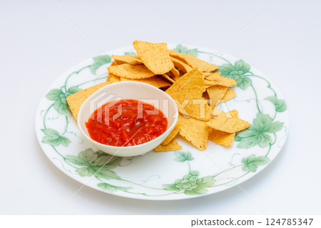 Corn tortilla chips and salsa 124785347