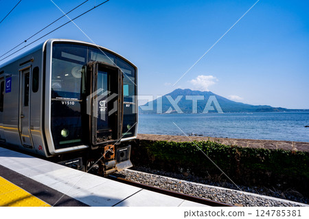 Train at Sengan-en Station and Sakurajima 124785381