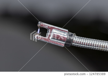 A close-up of the flame from an electric lighter 124785389