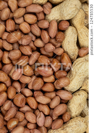 Shelled and Unshelled Peanuts Close-Up 124785530