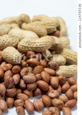 Shelled and Unshelled Peanuts Close-Up 124785536