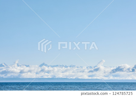 mountains on the coast, shrouded in clouds mountains on the coast, shrouded in clouds 124785725