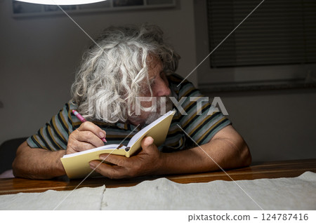 Late night reflections of an old man 124787416