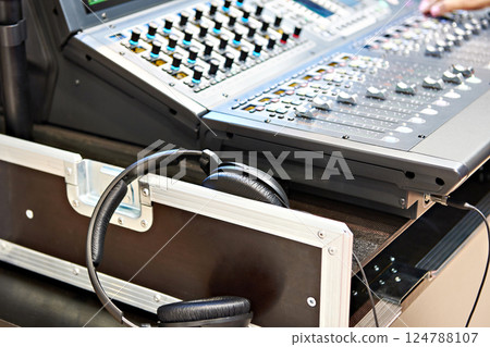 Mixing console digital and headphones Mixing console digital and headphones 124788107