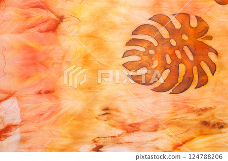 abstract pattern on silk fabric texture in yellow and brown tones abstract pattern on silk fabric texture in yellow and brown tones 124788206