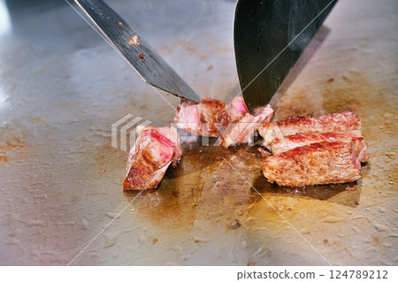 Steak cooking scene 124789212