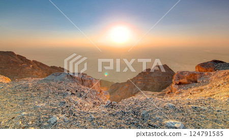 Sunset with rocks timelapse. Jebel Hafeet is a mountain located primarily in the environs of Al Ain 124791585
