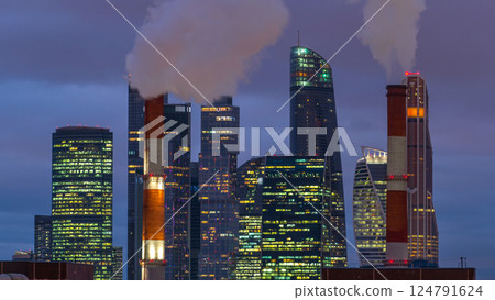 Moscow City skyscrapers in winter day to night timelapse. 124791624