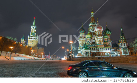 Moscow Kremlin timelapse hyperlapse with Spasskaya tower and Cathedral of St. Basil, Russia. Red Square in winter night 124791639