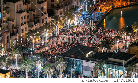 A general view of the bridge over man-made lake timelapse in Dubai downtown, United Arab Emirates. 124791691