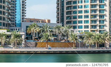 Dubai Marina towers and waterfall in Dubai timelapse hyperlapse 124791705