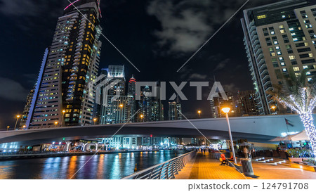 Dubai Marina towers and canal in Dubai night timelapse hyperlapse 124791708