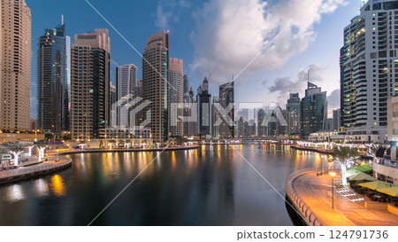 Dubai Marina towers and canal in Dubai night to day timelapse Dubai Marina towers and canal in Dubai night to day timelapse 124791736