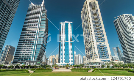 Residential buildings in Jumeirah Lake Towers timelapse hyperlapse in Dubai, UAE. Residential buildings in Jumeirah Lake Towers timelapse hyperlapse in Dubai, UAE. 124791760