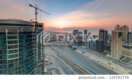 Sunset aerial top view timelapse at Dubai Marina and JLT in Dubai, UAE Sunset aerial top view timelapse at Dubai Marina and JLT in Dubai, UAE 124791776