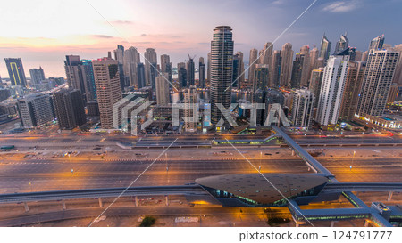 Aerial top view day to night timelapse of Dubai Marina and JLT in Dubai, UAE 124791777