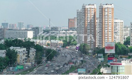 Traffic on the elevated avenue road aerial timelapse overpass on highway in a big city Traffic on the elevated avenue road aerial timelapse overpass on highway in a big city 124791807
