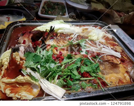 fish baked with vegetables cabbage and peppers and mushrooms fish baked with vegetables cabbage and peppers and mushrooms 124791898