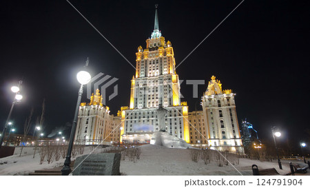 Hotel Ukraine winter night timelapse hyperlapse with bridge over Moscow River. Hotel Ukraine winter night timelapse hyperlapse with bridge over Moscow River. 124791904