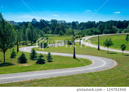 cycle path in the recreation park in summer 124791948