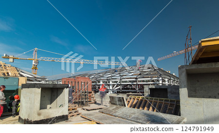 Builders and carpenters working on the roof timelapse 124791949