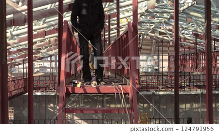 Welder working with electrode at semi-automatic arc welding in manufacture production plant timelapse Welder working with electrode at semi-automatic arc welding in manufacture production plant timelapse 124791956