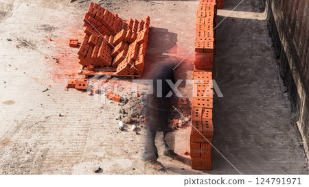 Bricklayers laying bricks to make a walls timelapse. Bricklayers laying bricks to make a walls timelapse. 124791971