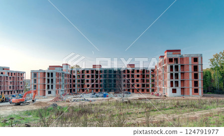 Construction site with buildings under construction and multi-storey residential homes timelapse hyperlapse. Construction site with buildings under construction and multi-storey residential homes timelapse hyperlapse. 124791977
