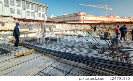 Steel bar rebar metal framework reinforcement for concrete at construction site timelapse. Steel bar rebar metal framework reinforcement for concrete at construction site timelapse. 124791980
