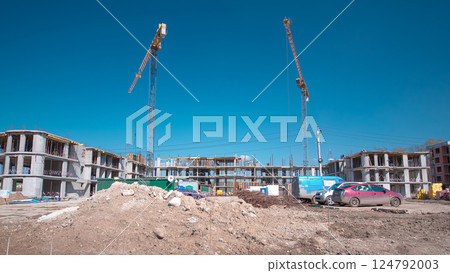 Large construction site with buildings under construction and multi-storey residential homes timelapse hyperlapse. 124792003