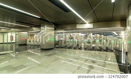 Interior of a modern subway station with turnstile timelapse hyperlapse Interior of a modern subway station with turnstile timelapse hyperlapse 124792007