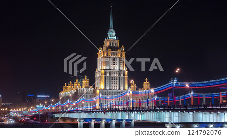 Hotel Ukraine winter night timelapse hyperlapse with bridge over Moscow River. 124792076