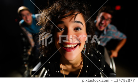 Portrait of a smiling wheelchair user with friends, confident and beautiful, empowering, artistic, inclusivity and friendship 124792877
